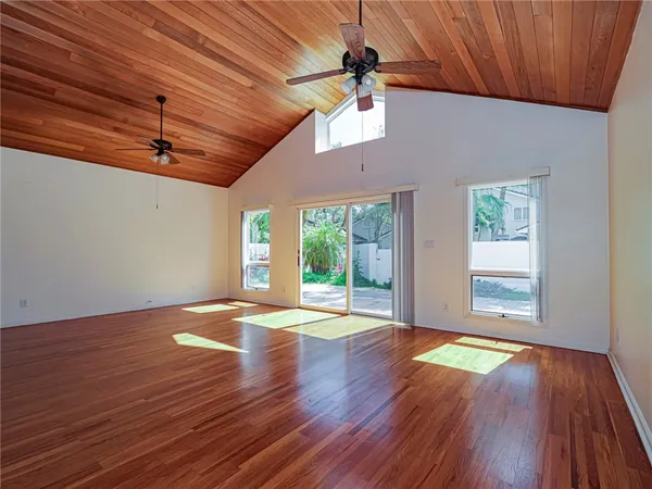 a kitchen with a sink appliances and cabinets