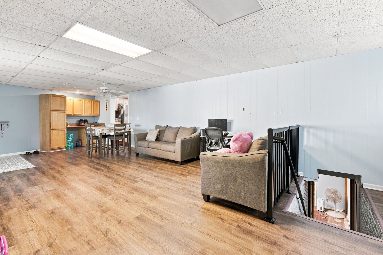 913 Church Road Aurora, IL 60505 - Photo 11 of 31 a living room with furniture and wooden floor
