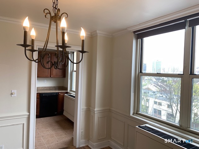 50 Glenbrook Road, Unit 5G Stamford, CT 06902 - Photo 25 of 40 a kitchen with a refrigerator and a sink