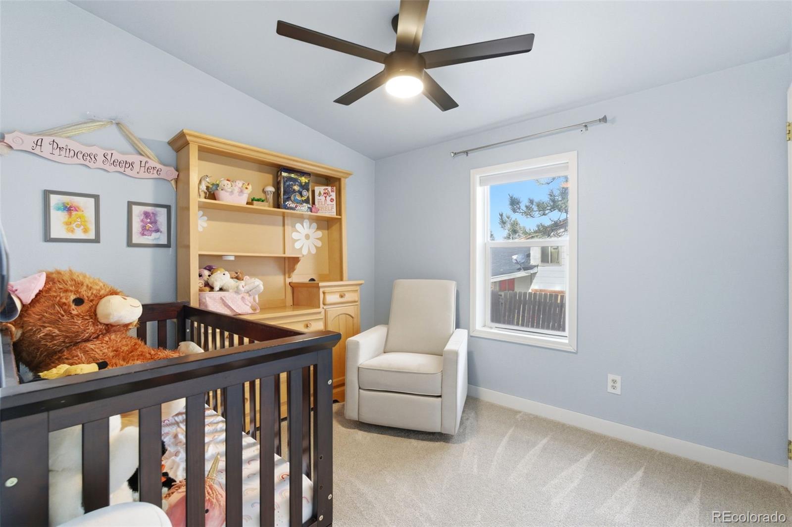 8137 Lafayette Street Denver, CO 80229 - Photo 24 of 36 a bedroom with furniture and a window
