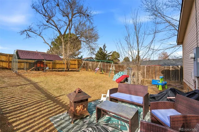 a view of a terrace with seating area
