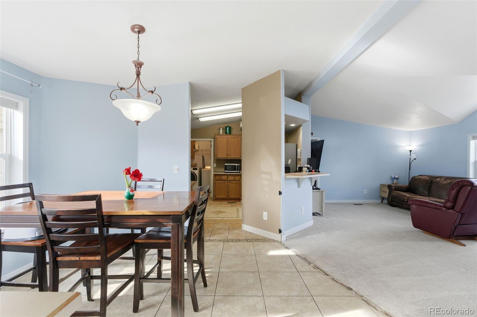 8137 Lafayette Street Denver, CO 80229 - Photo 4 of 36 a dining room with furniture and window
