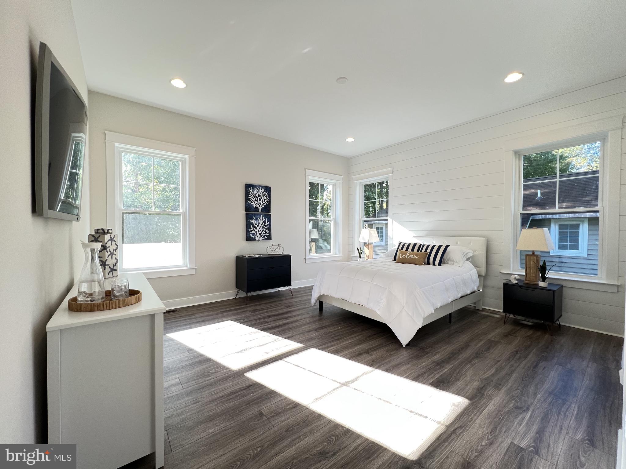 30491 Blue Beech Lane Frankford, DE 19945 - Photo 12 of 17 a bedroom with a bed and wooden floor