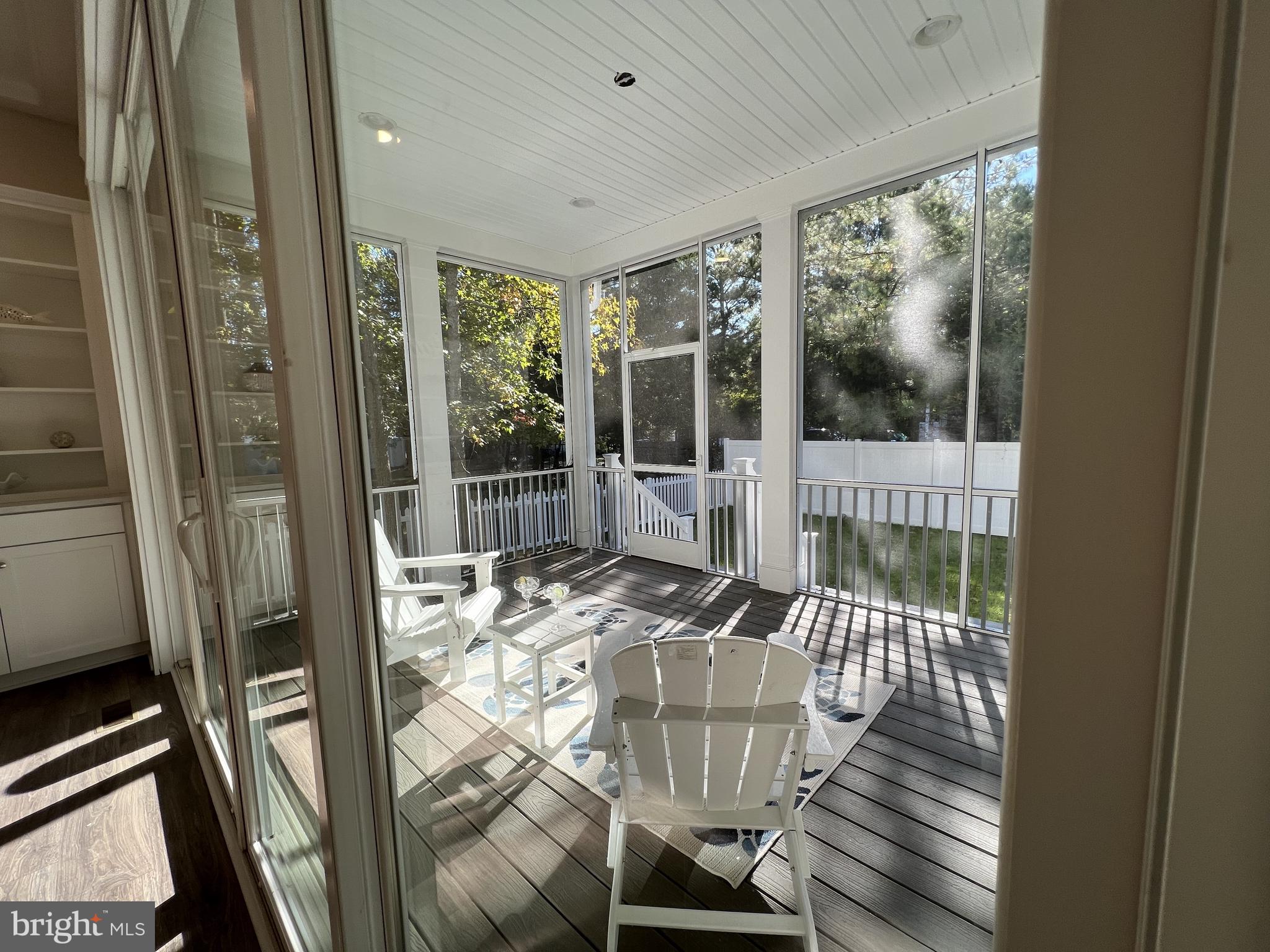 30491 Blue Beech Lane Frankford, DE 19945 - Photo 7 of 17 a view of a dining room with furniture wooden floor and garden