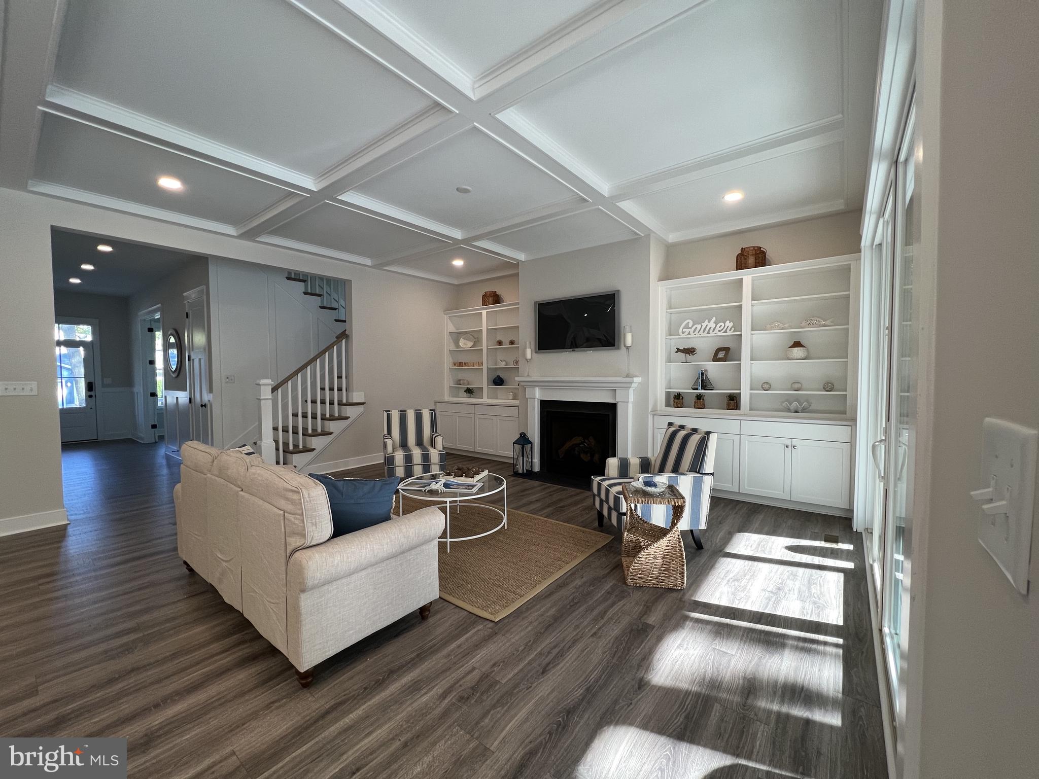 30491 Blue Beech Lane Frankford, DE 19945 - Photo 8 of 17 a living room with furniture and a fireplace