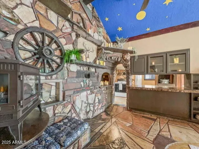 a kitchen with stainless steel appliances granite countertop a stove and a sink