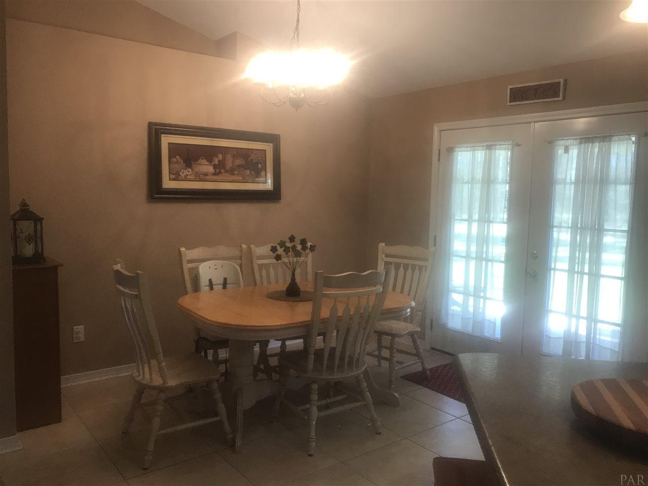 4915 Kolb Road Milton, FL 32570 - Photo 8 of 11 Double French doors to covered back porch