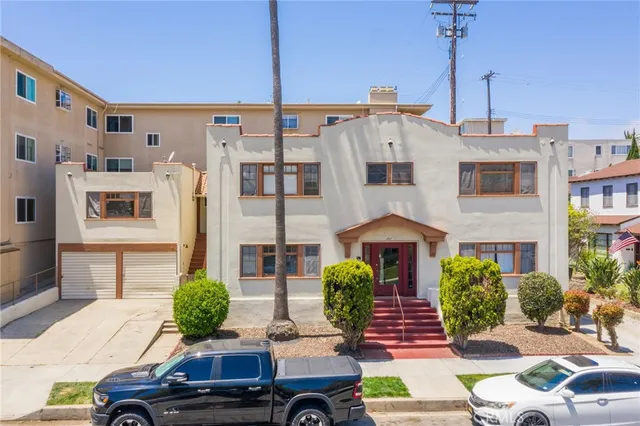 a front view of a house with yard