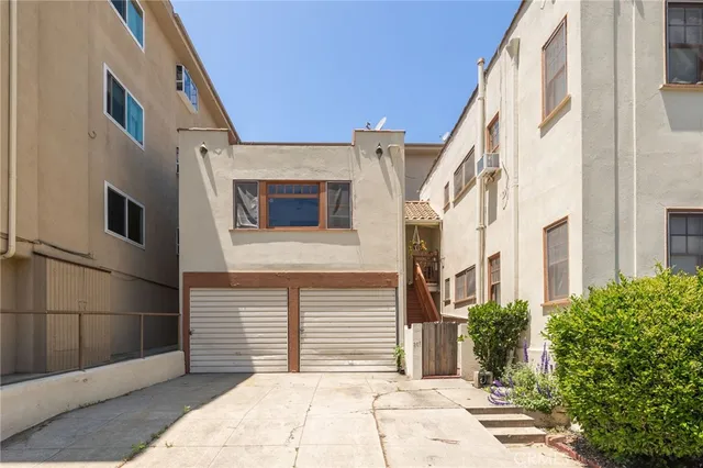 a front view of a house with a garage