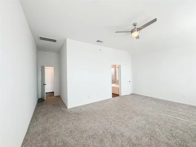 a view of storage and utility room with washer and dryer