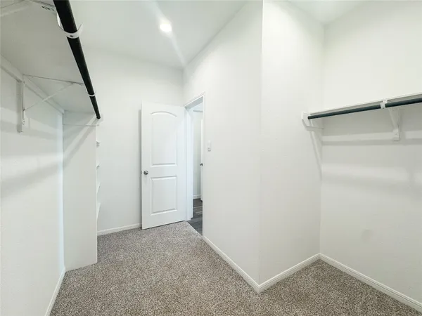 a view of hallway with white walls
