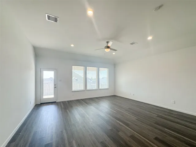a view of hallway with white walls