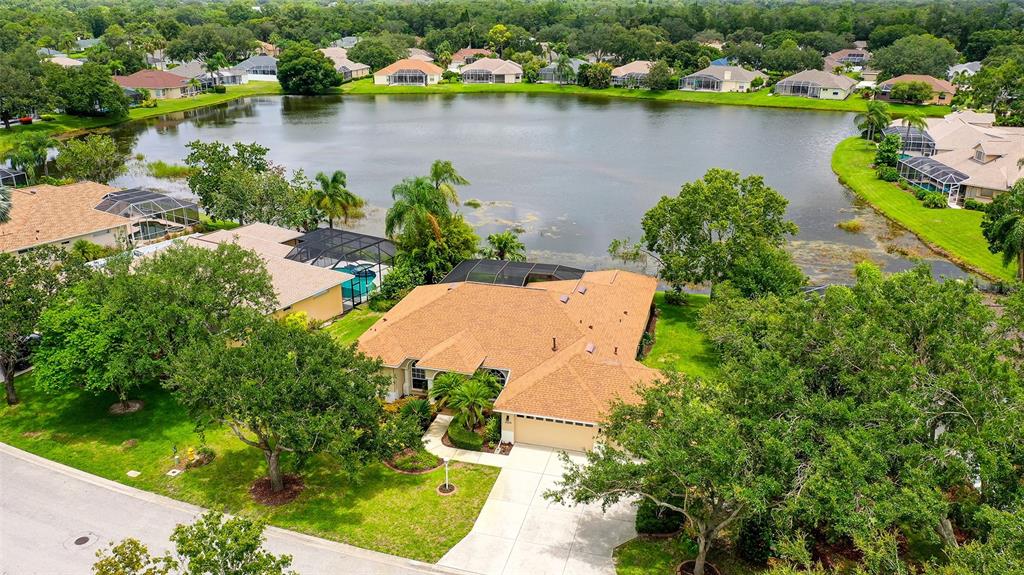 11215 Rivers Bluff Circle Lakewood Ranch, FL 34202 - Photo 1 of 1 an aerial view of a house with a lake view