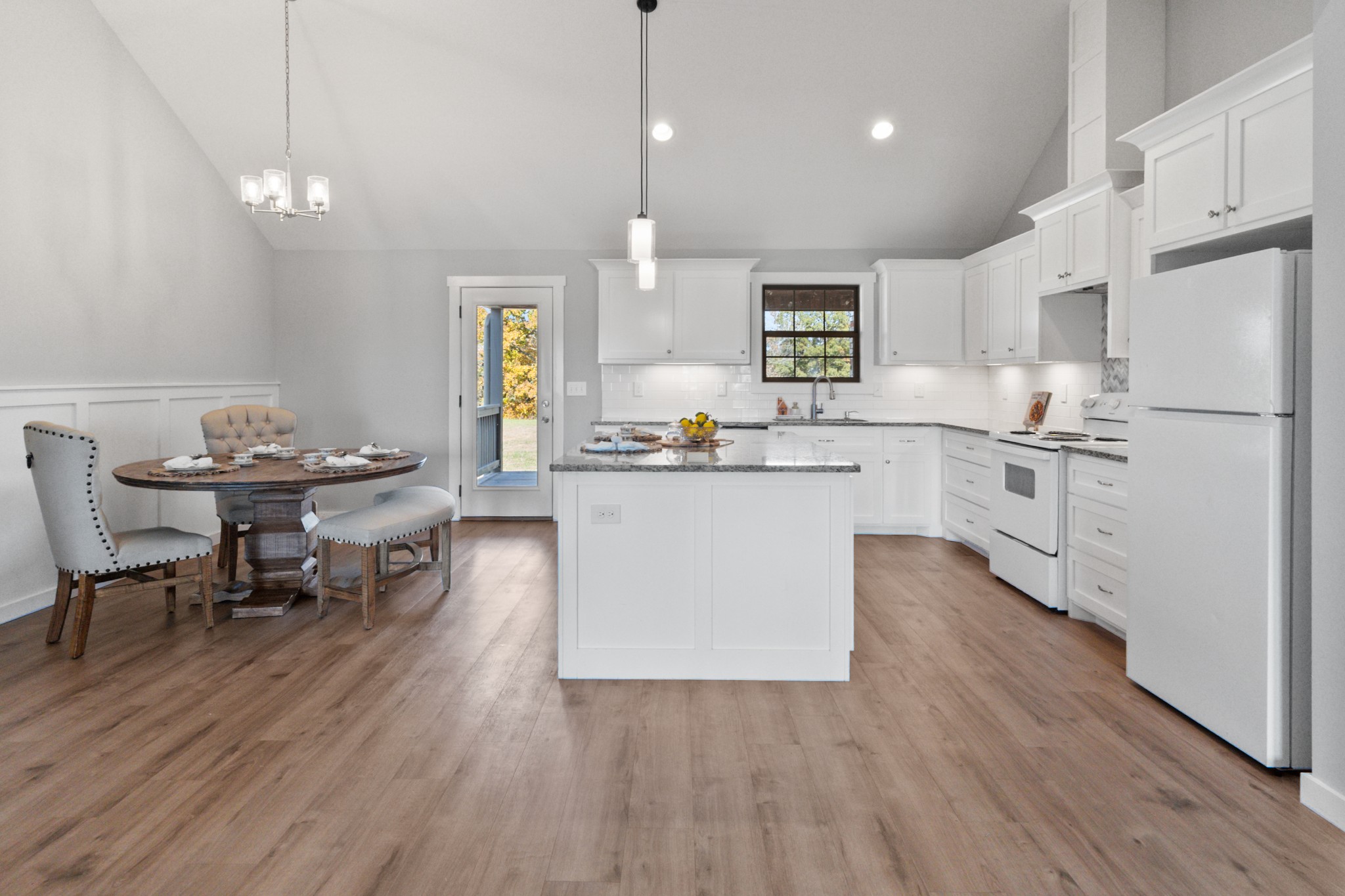120 Freeland Road Portland, TN 37148 - Photo 11 of 61 a kitchen with white cabinets and counter space