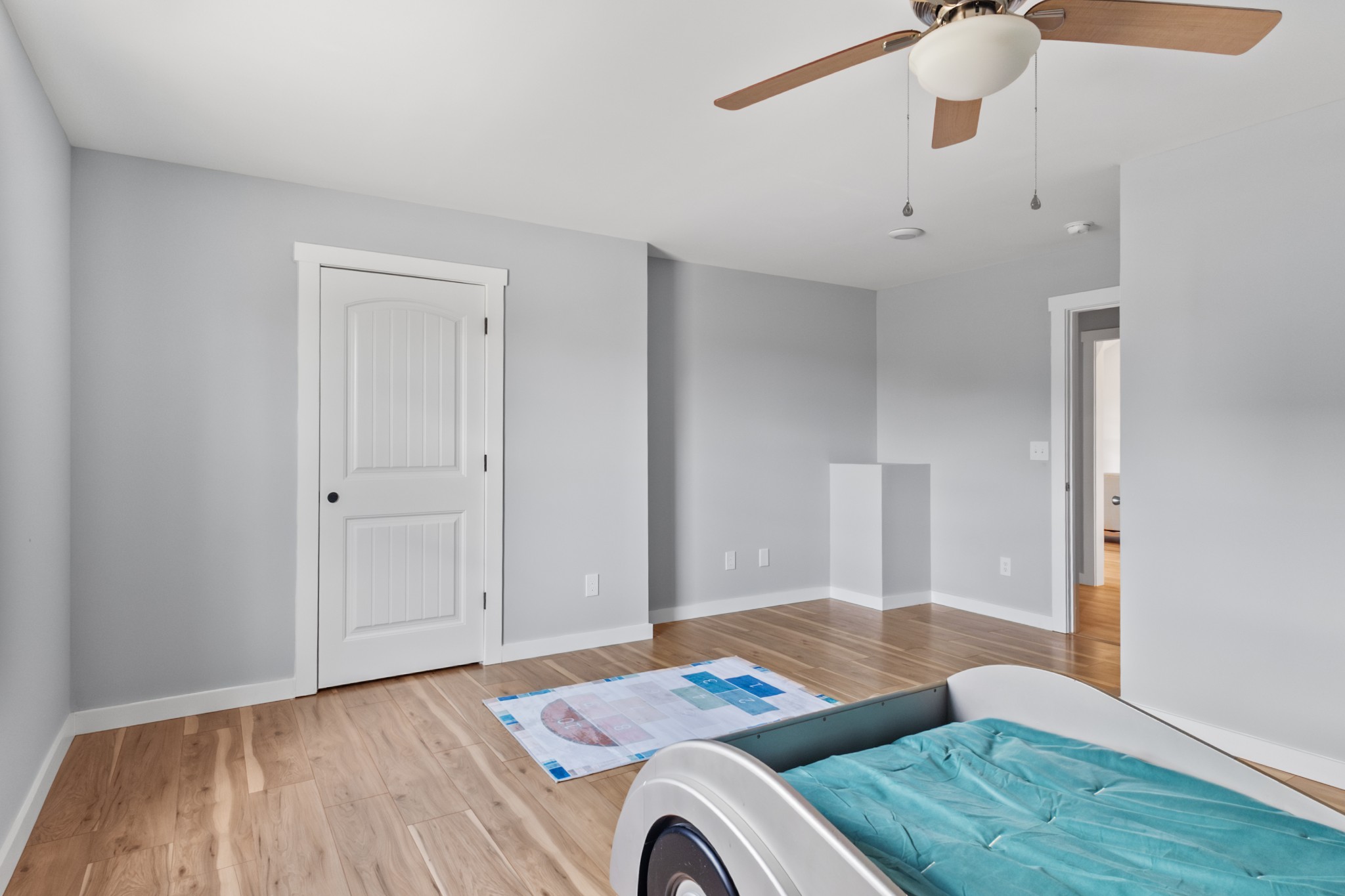 120 Freeland Road Portland, TN 37148 - Photo 26 of 61 a bedroom with a bed and a chandelier