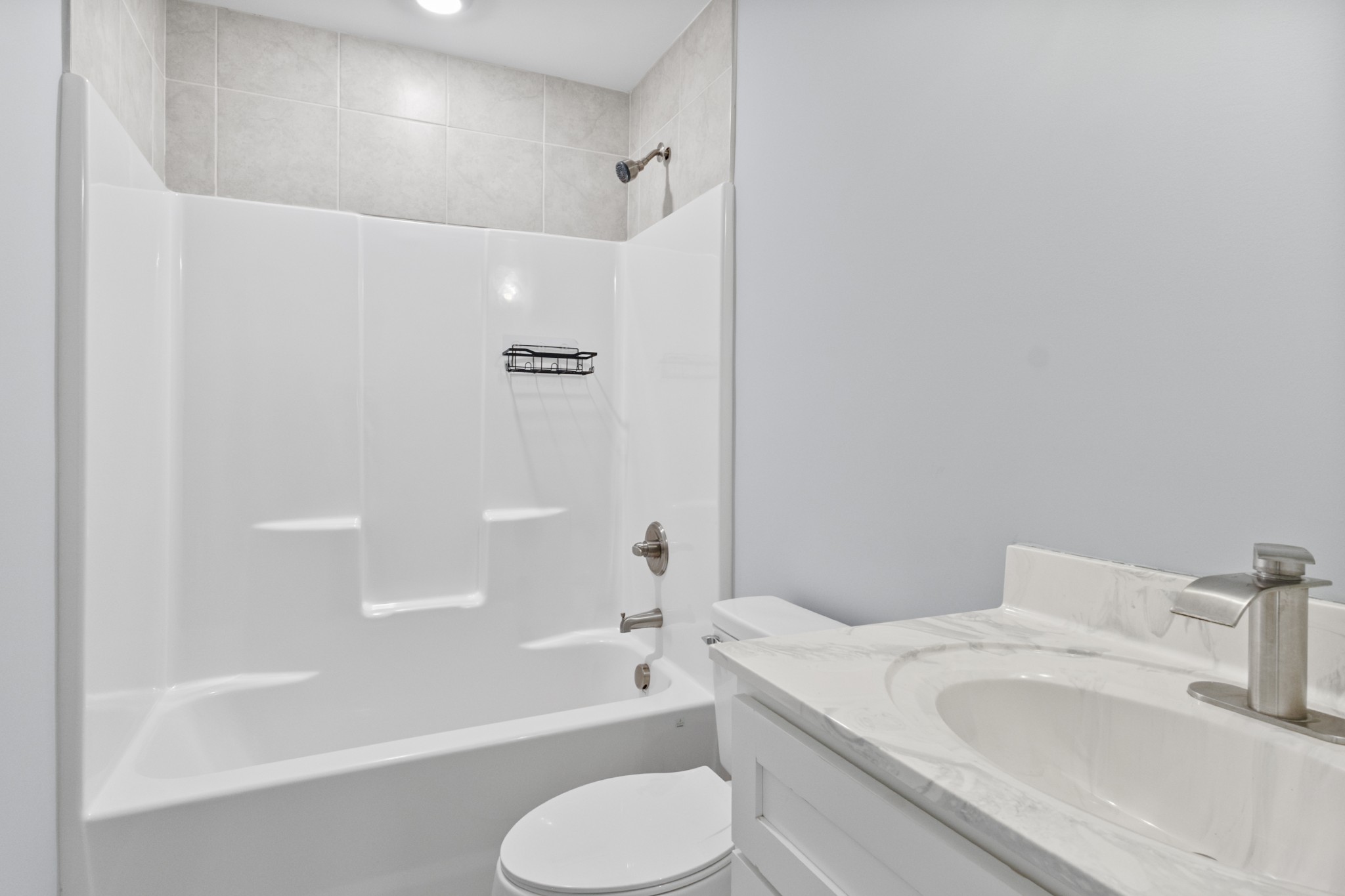 120 Freeland Road Portland, TN 37148 - Photo 31 of 61 a bathroom with a sink toilet and bathtub