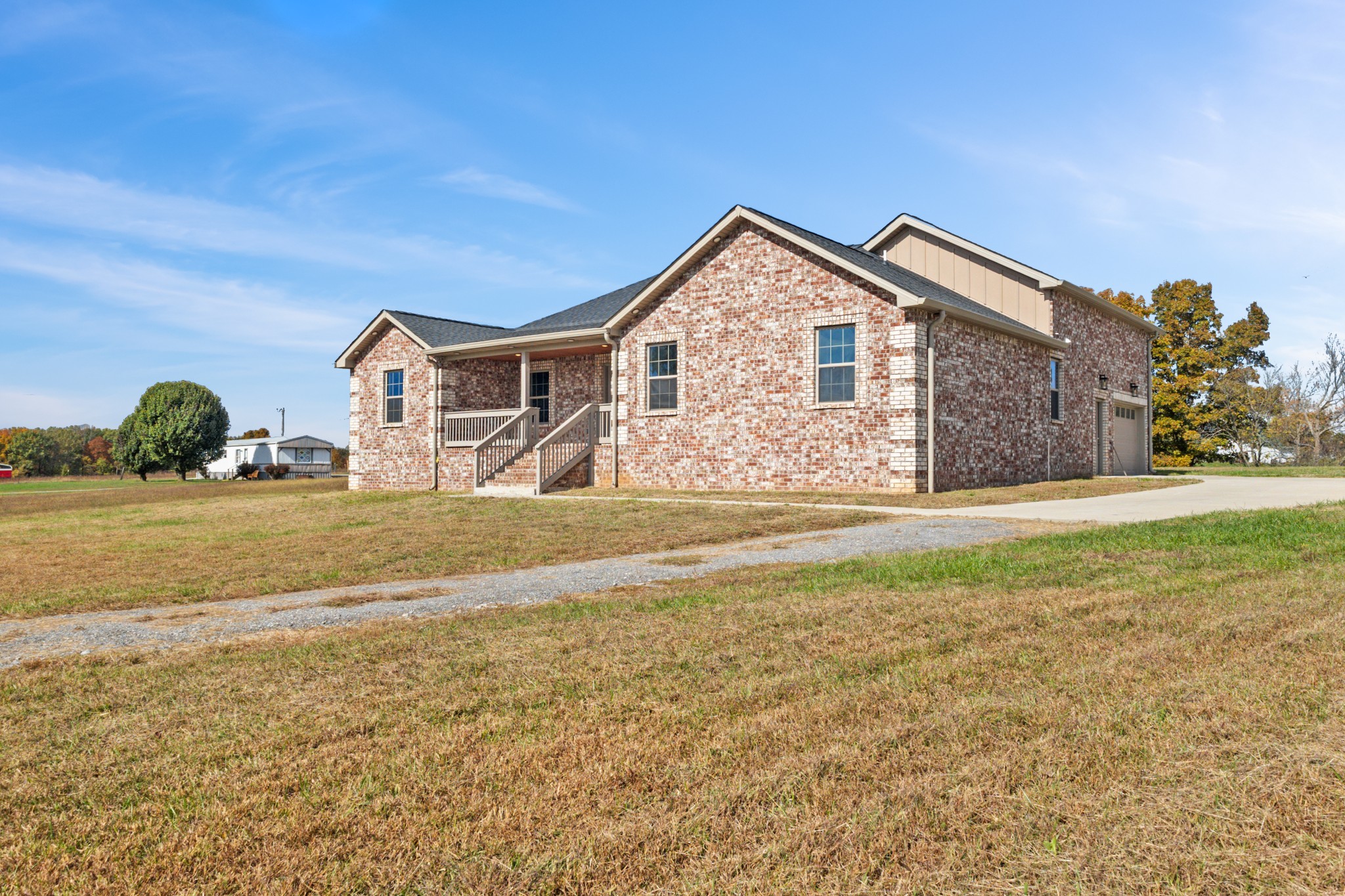 120 Freeland Road Portland, TN 37148 - Photo 4 of 61 a front view of a house with a yard