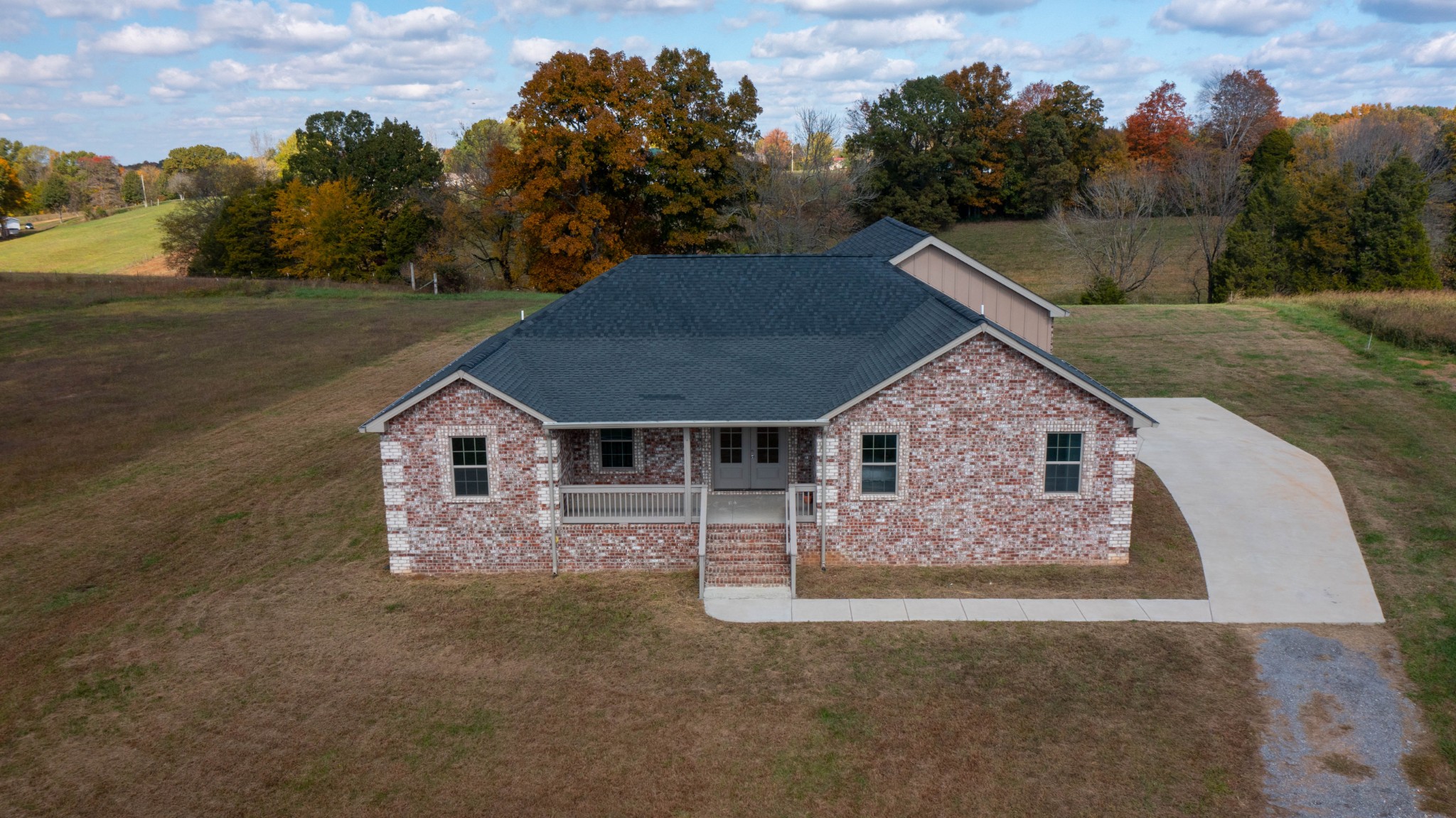 120 Freeland Road Portland, TN 37148 - Photo 47 of 61 a front view of a house with a yard and garage