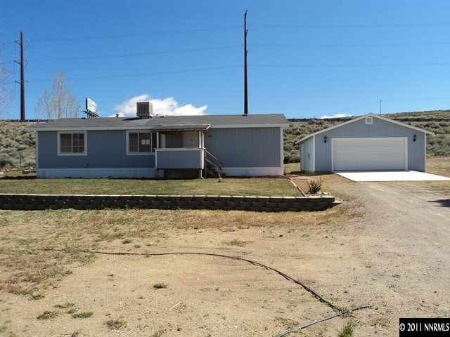 5600 West Ranger Road Reno, NV 89506 - Photo 3 of 10 a view of a house with a swimming pool