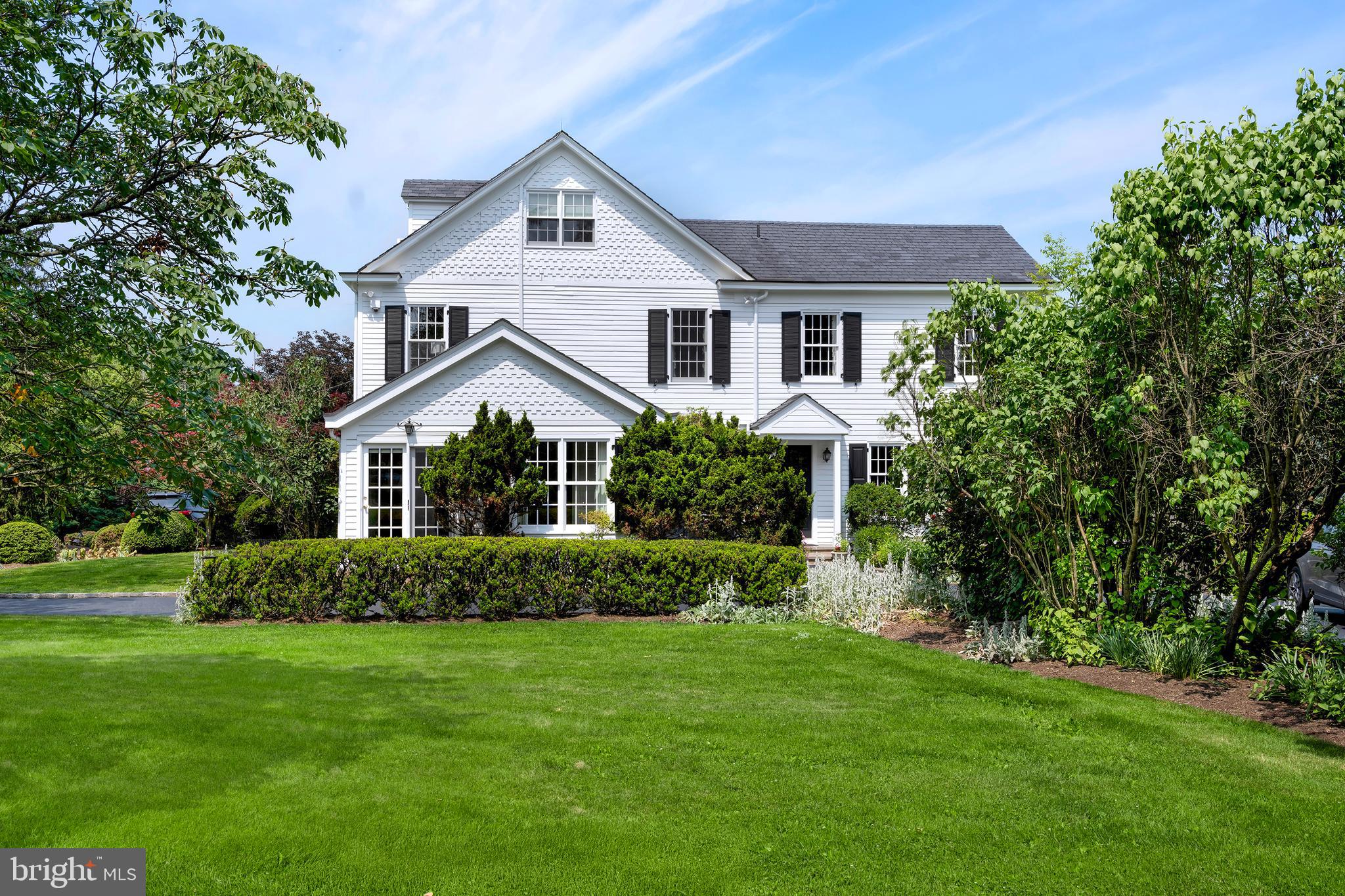 122 Bedens Brook Road Skillman, NJ 08558 - Photo 6 of 49 a front view of a house with a garden