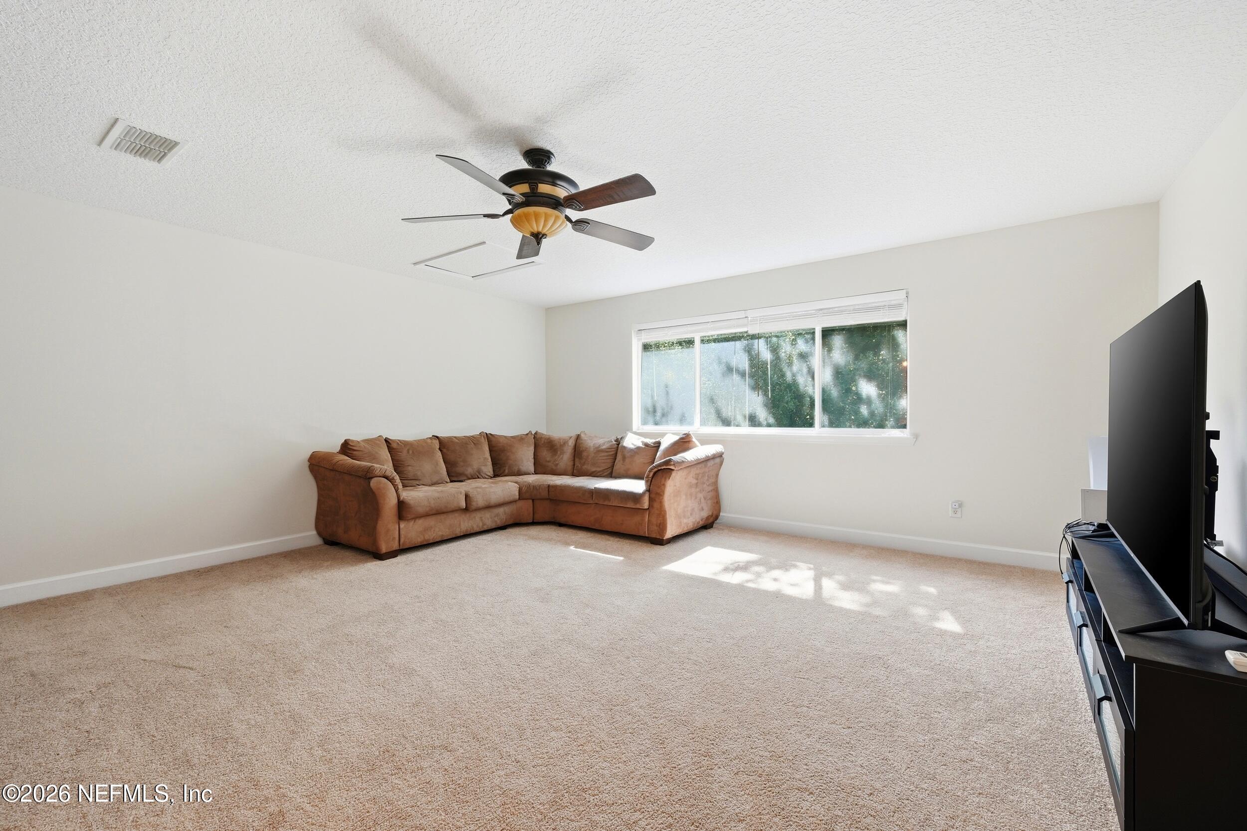 14478 Millhopper Road Jacksonville, FL 32258 - Photo 32 of 57 upstairs bonus/flex room