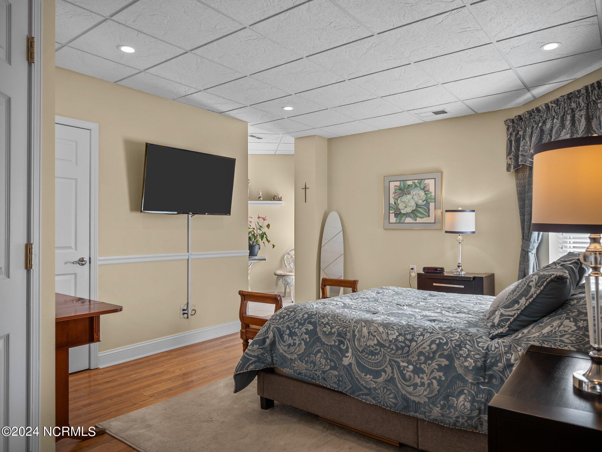 2000 New River Inlet Road, Unit 1004 North Topsail Beach, NC 28460 - Photo 35 of 48 Primary bedroom