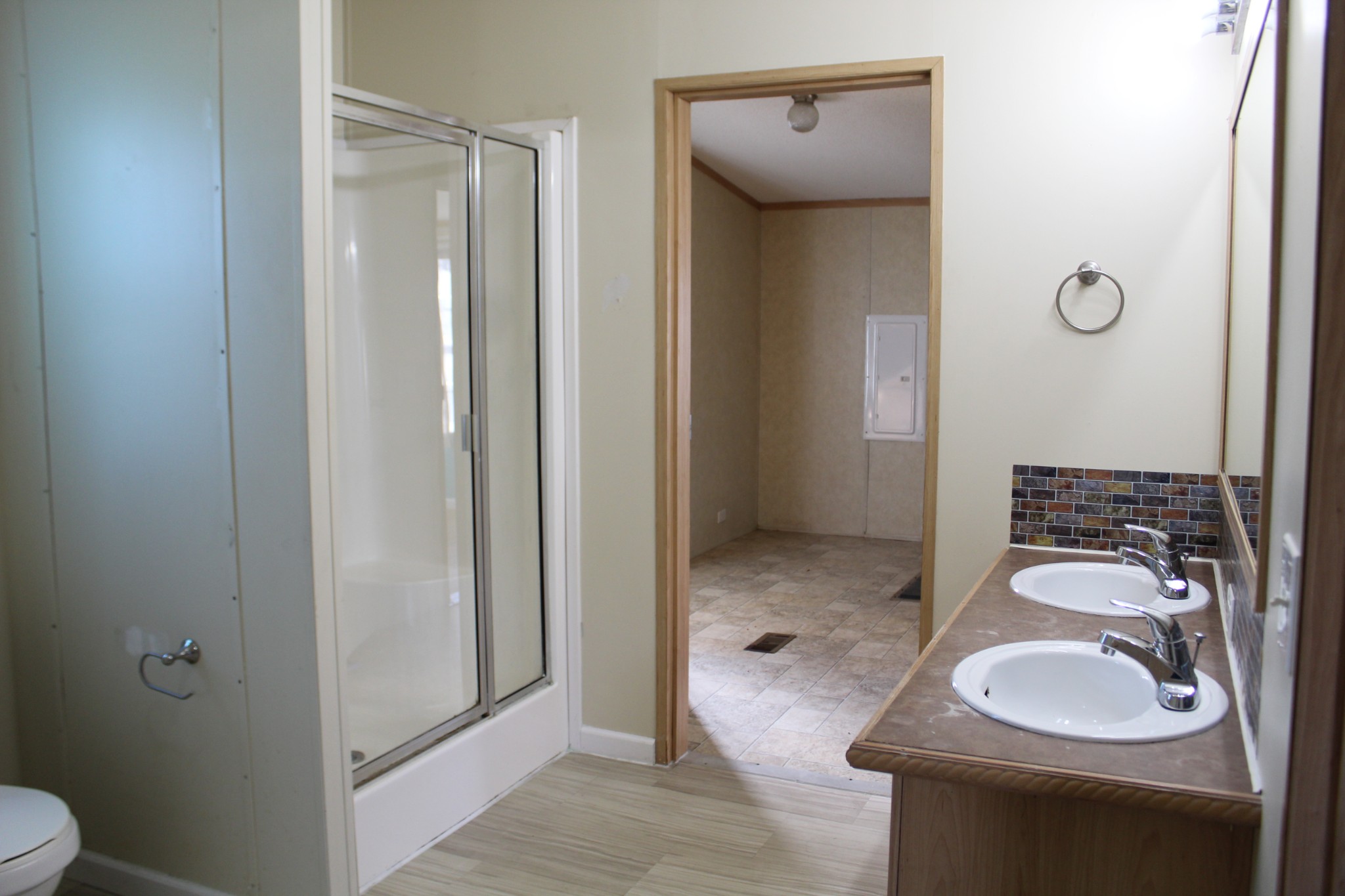 108 Wimbley Road Estill Springs, TN 37330 - Photo 10 of 27 a bathroom with a granite countertop sink toilet and shower