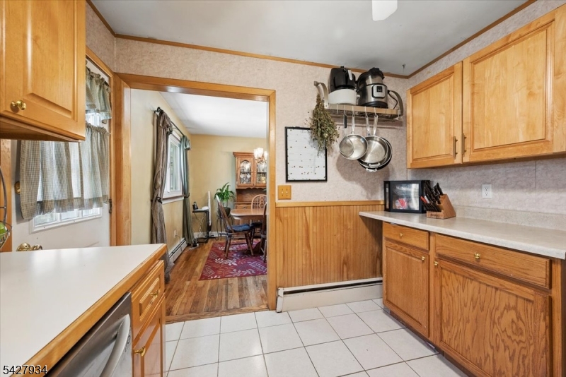 77 Brooklyn Road Stanhope, NJ 07874 - Photo 4 of 27 a kitchen with sink cabinets and outdoor view