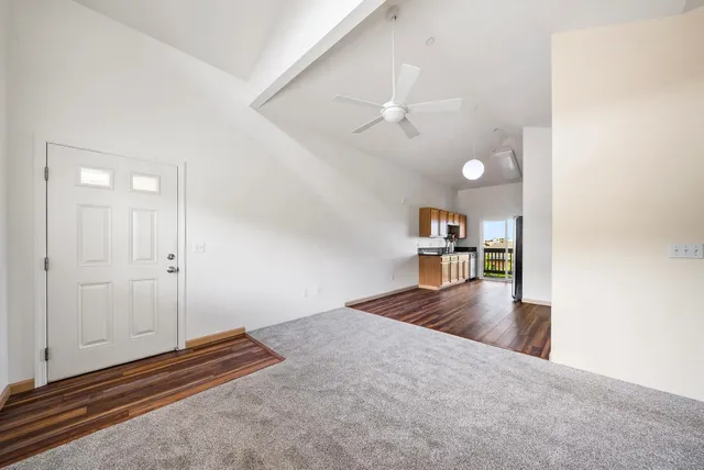 a view of a livingroom with furniture and wooden floor