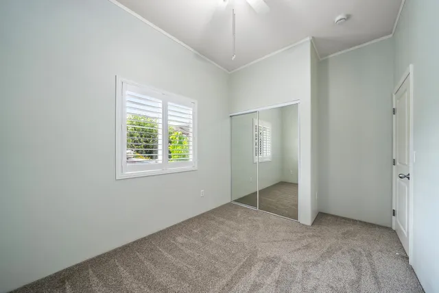 front view of a house with a small garden