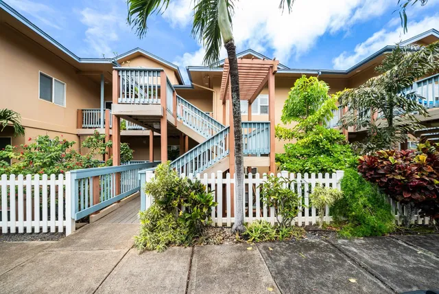 a view of a wooden fence