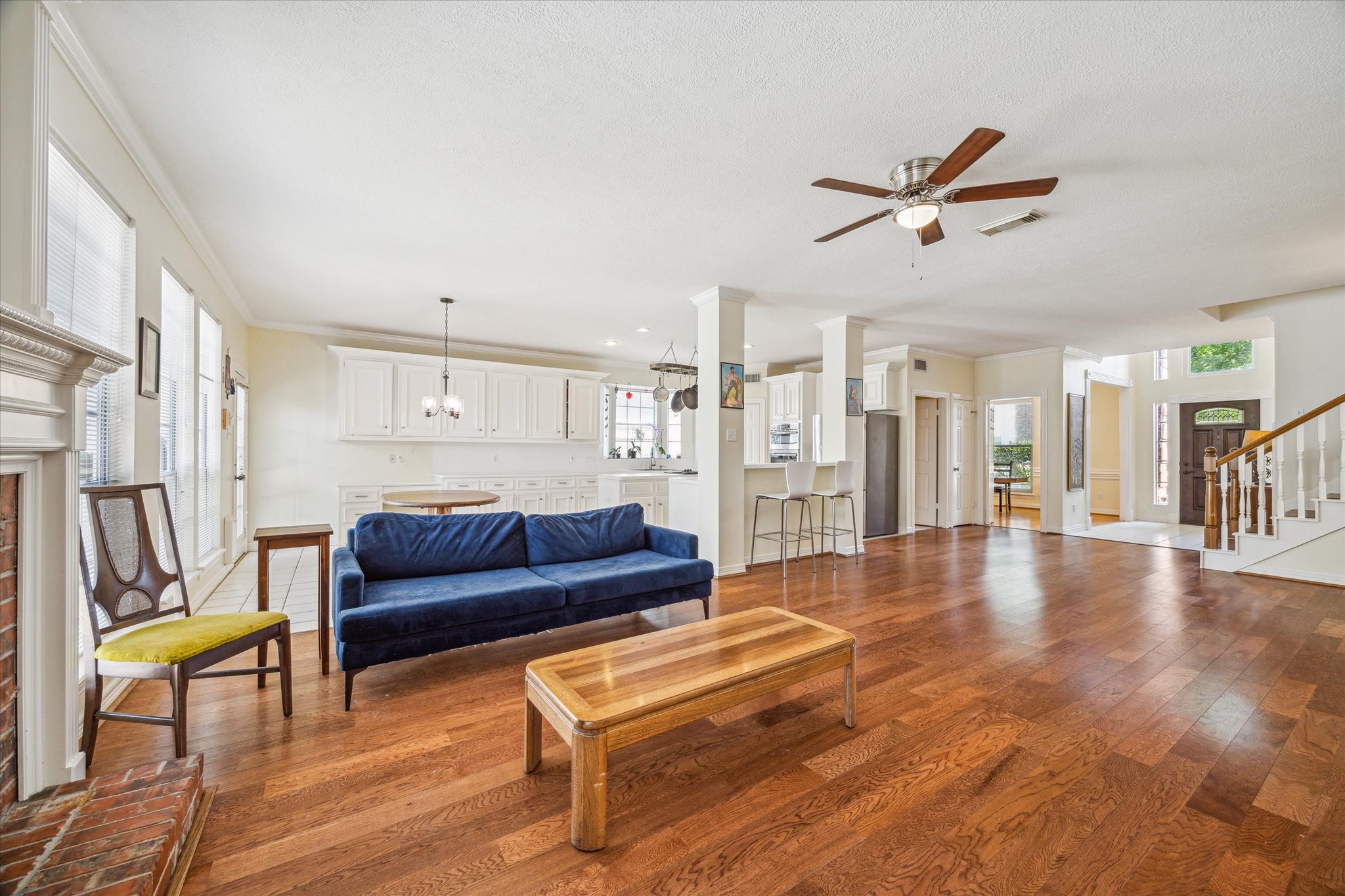 7930 Tizerton Court Spring, TX 77379 - Photo 11 of 30 a living room with furniture and a wooden floor