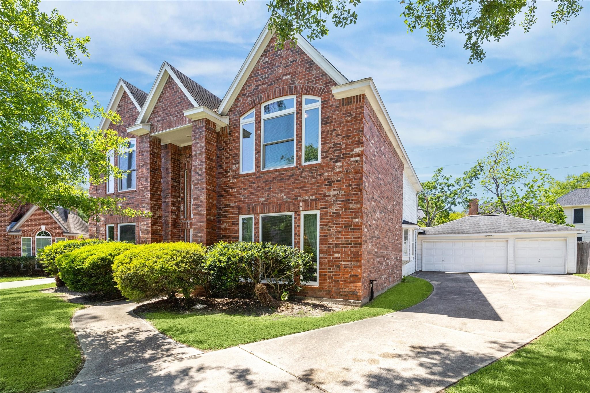 7930 Tizerton Court Spring, TX 77379 - Photo 2 of 30 a front view of a house with a yard