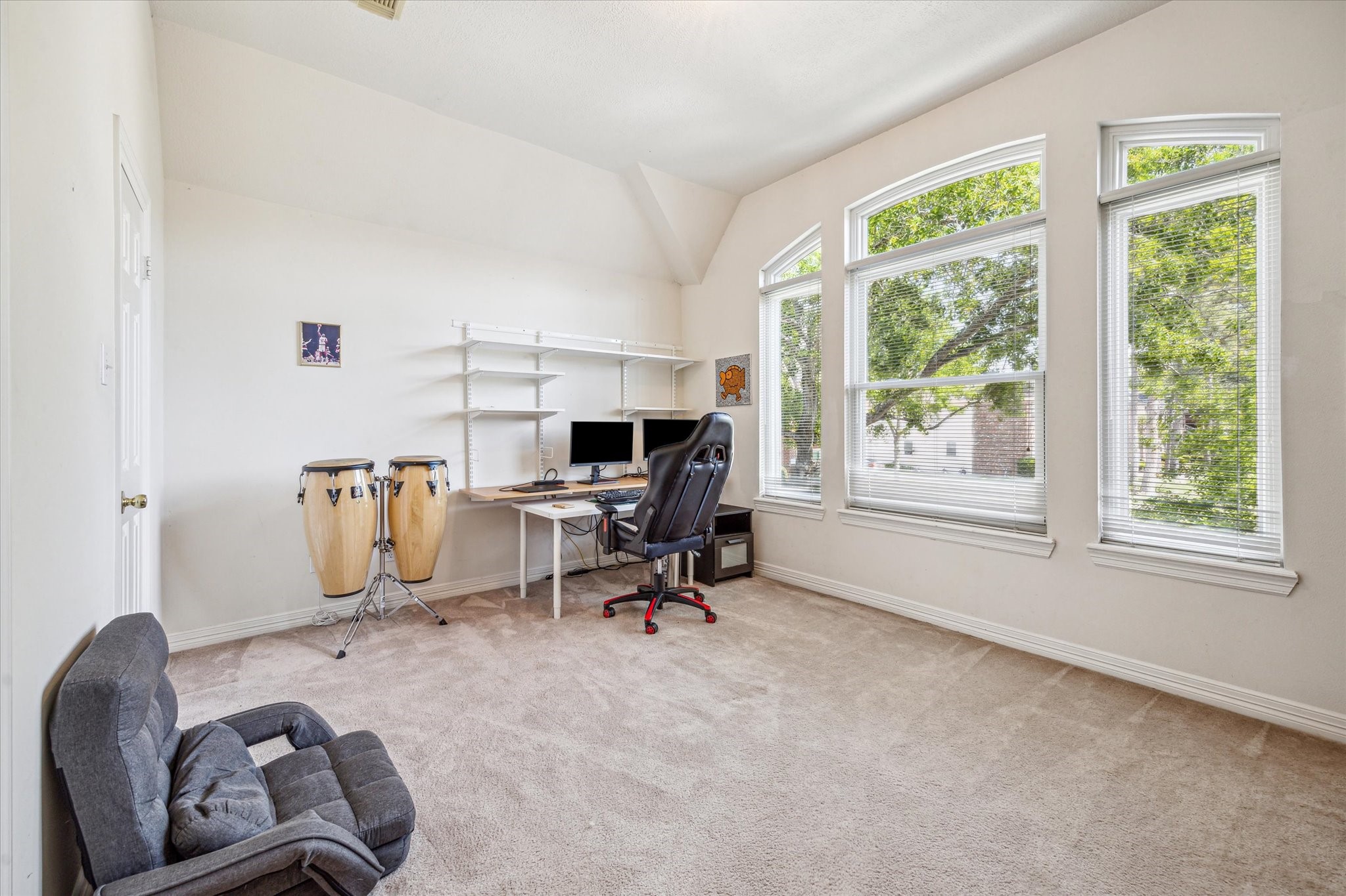 7930 Tizerton Court Spring, TX 77379 - Photo 24 of 30 a workspace with furniture and a window