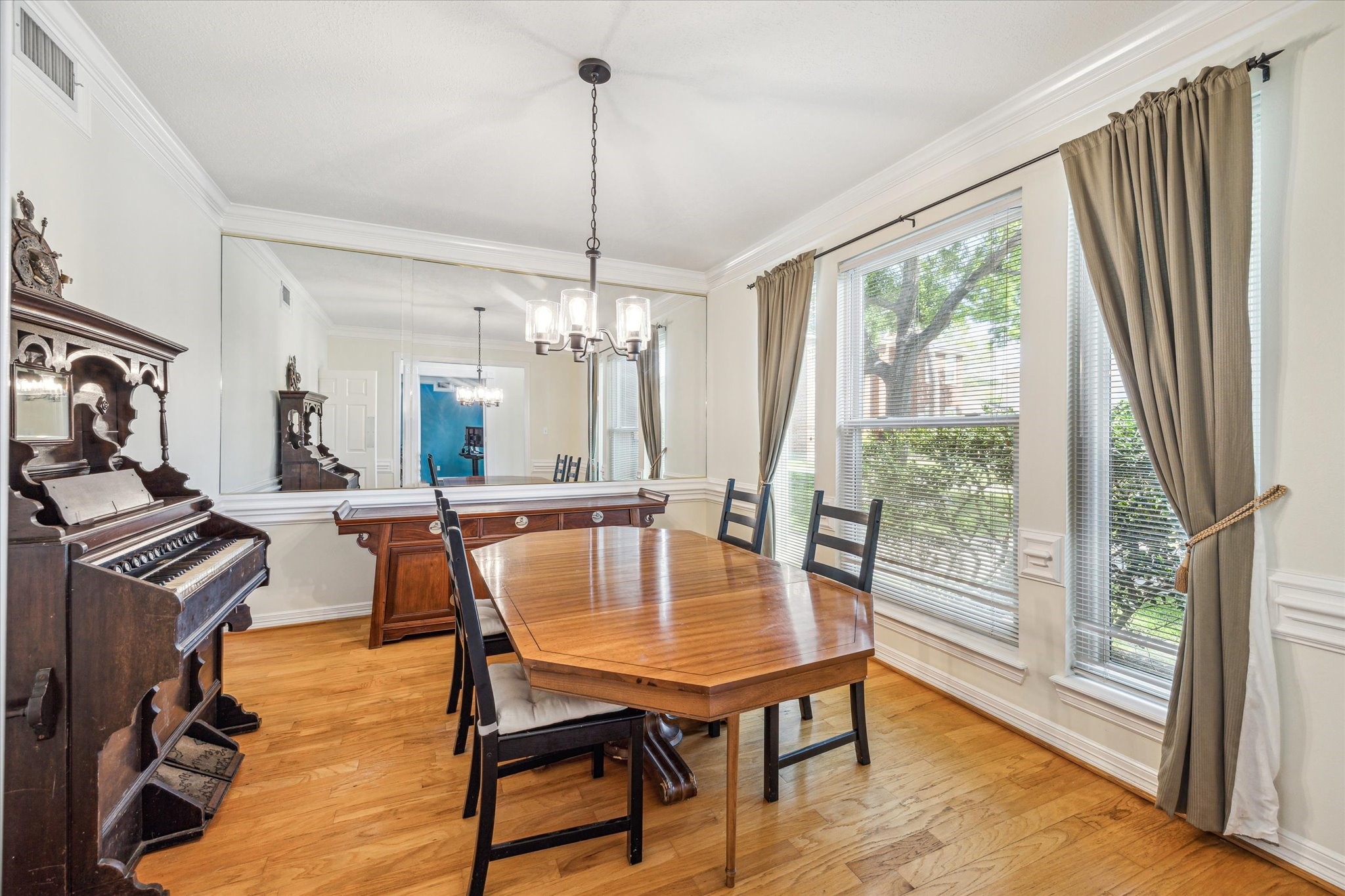 7930 Tizerton Court Spring, TX 77379 - Photo 7 of 30 a view of a dining room with furniture window and wooden floor