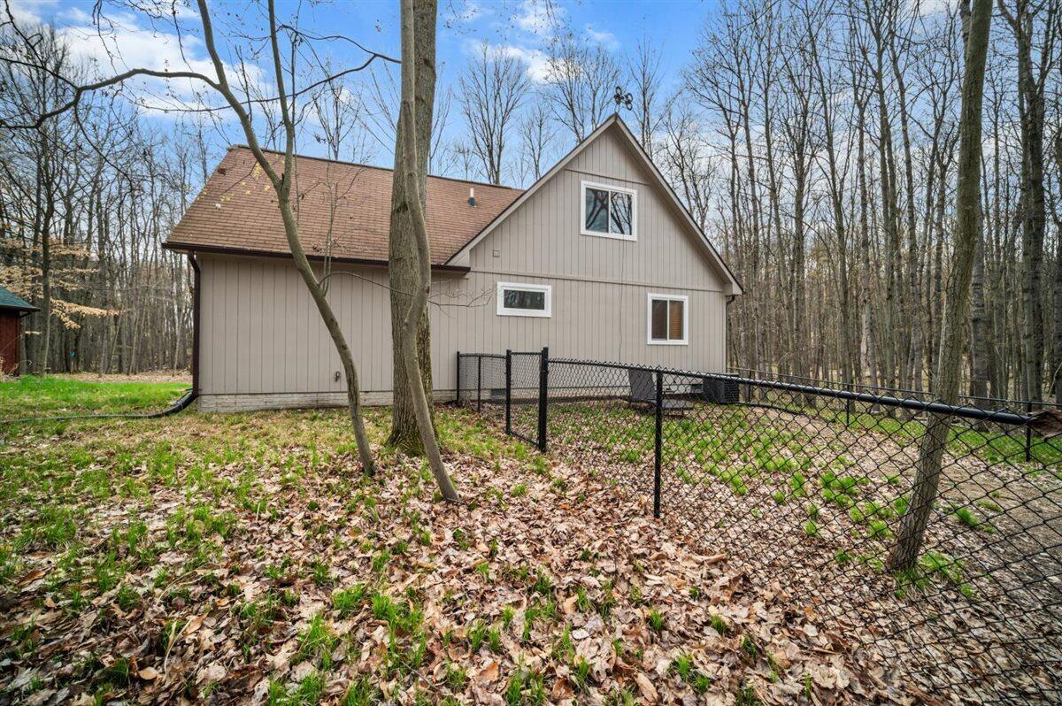 9341 Center Lane Canadian Lakes, MI 49346 - Photo 17 of 27 17 Backyard