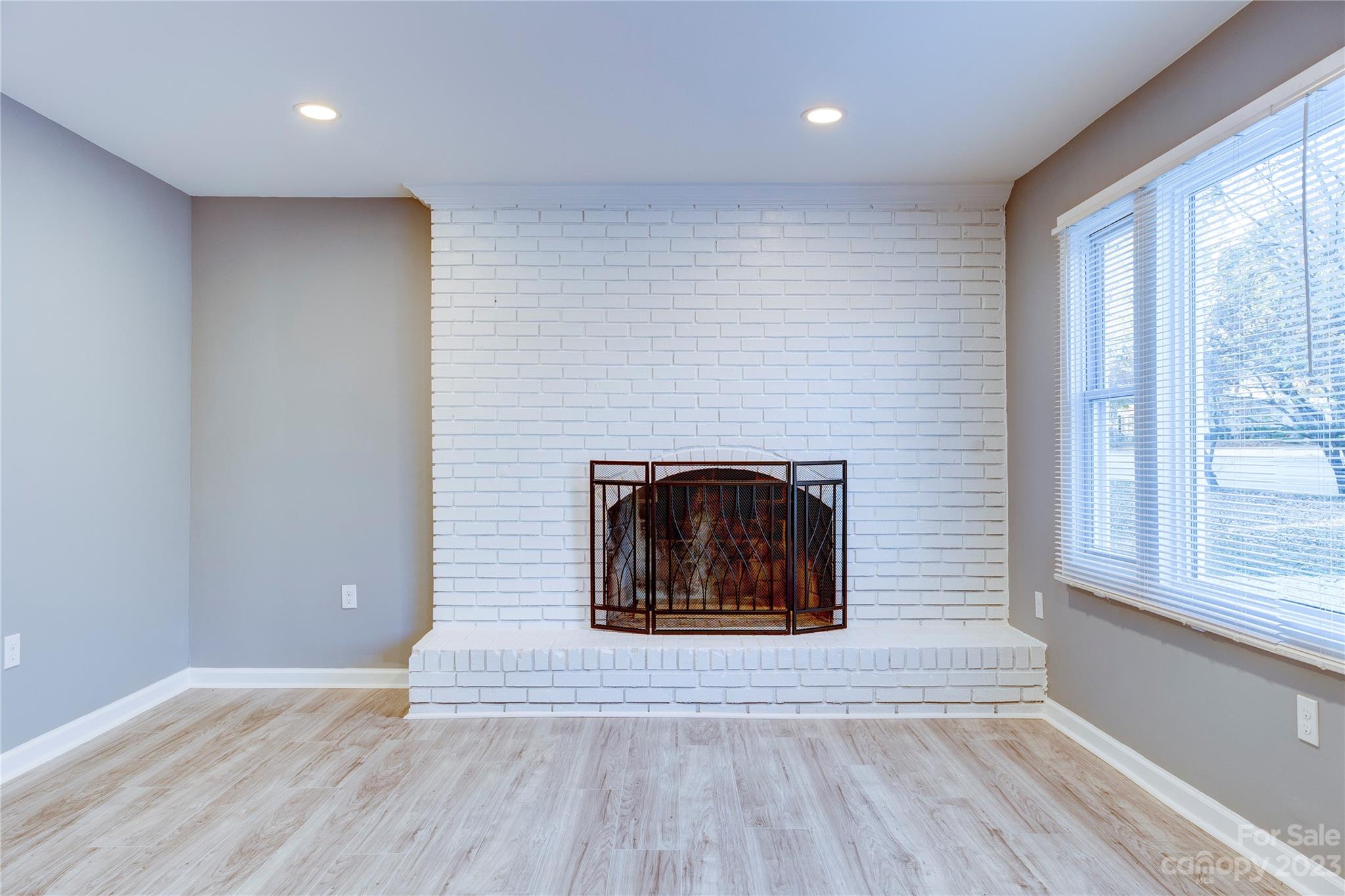 4641 Fallston Road Lawndale, NC 28090 - Photo 21 of 38 a view of a livingroom with a fireplace and window