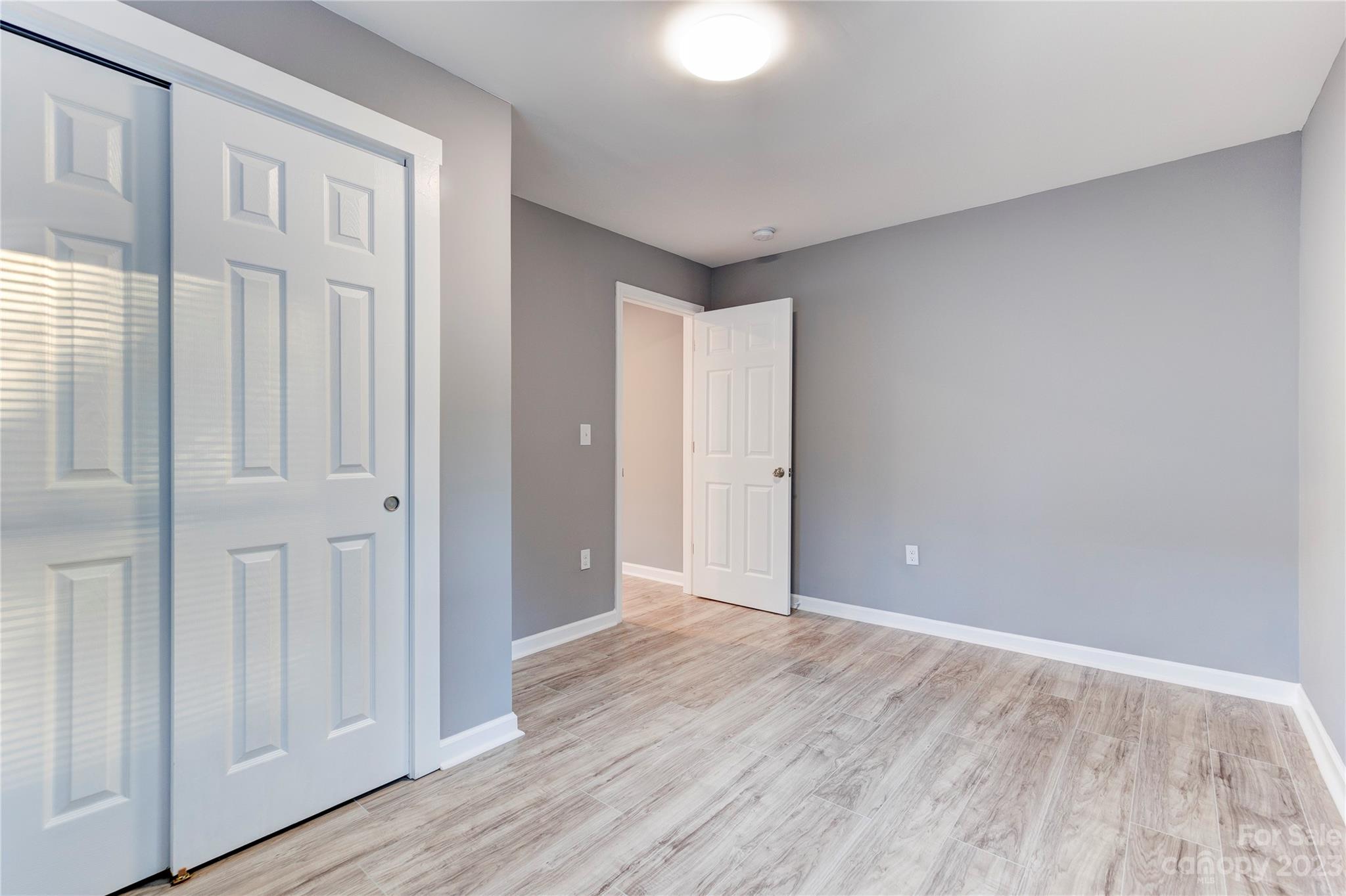 4641 Fallston Road Lawndale, NC 28090 - Photo 24 of 38 a view of an empty room with wooden floor