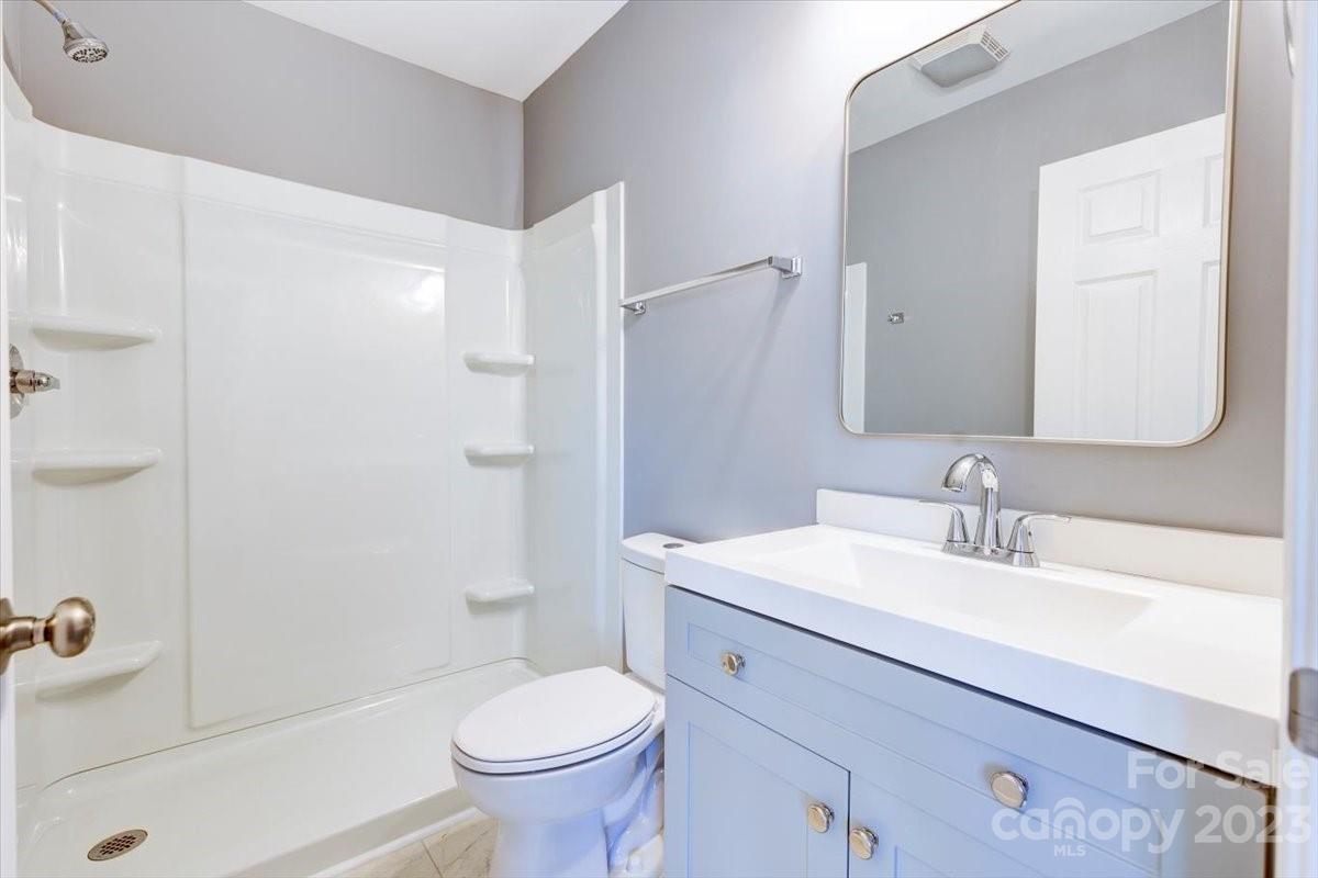 4641 Fallston Road Lawndale, NC 28090 - Photo 32 of 38 a bathroom with a sink toilet and shower