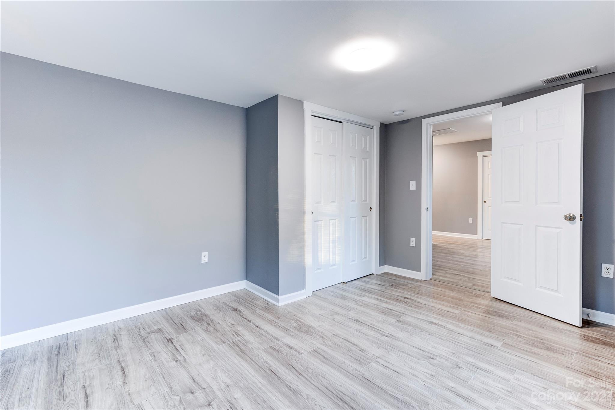 4641 Fallston Road Lawndale, NC 28090 - Photo 33 of 38 a view of an empty room with wooden floor