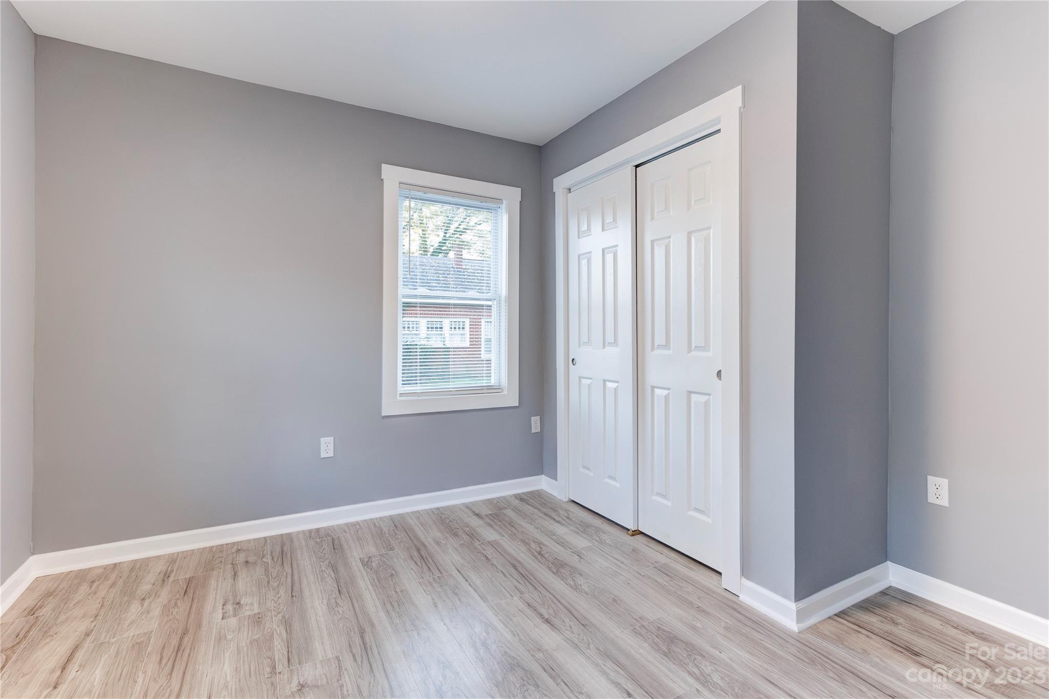 4641 Fallston Road Lawndale, NC 28090 - Photo 35 of 38 a view of an empty room with wooden floor and a window