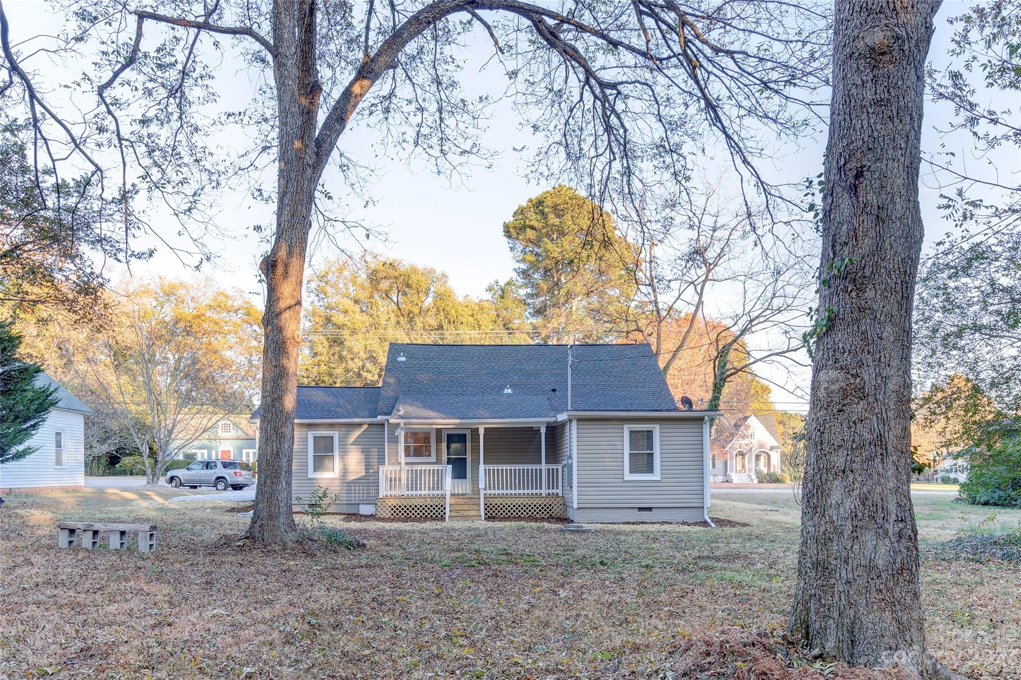 4641 Fallston Road Lawndale, NC 28090 - Photo 8 of 38 a house view with a trees and a large tree