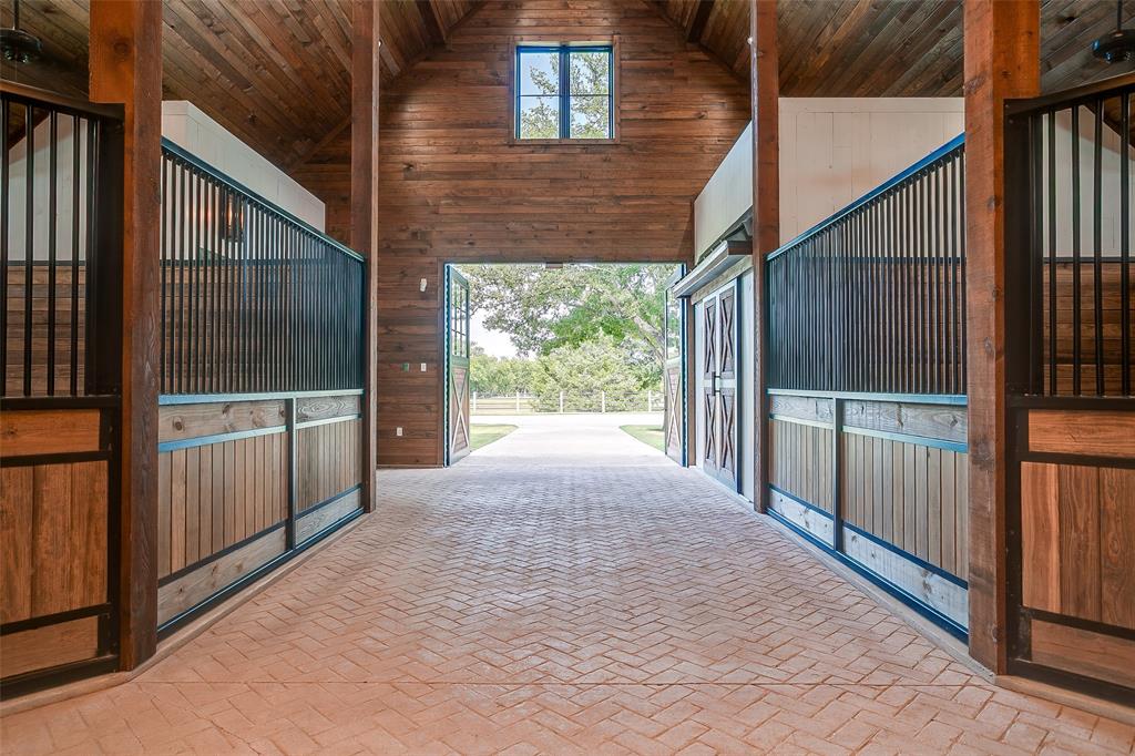 5000 T W King Road Southlake, TX 76092 - Photo 10 of 40 Spacious stalls featuring thoughtfully designed systems for safety and efficiency.