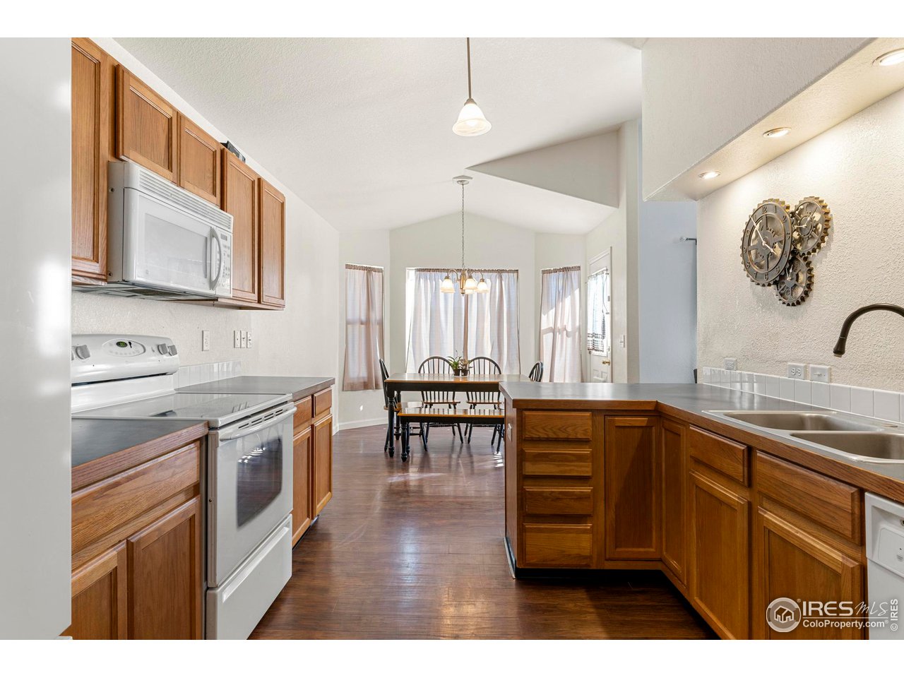 8726 19th St Road Greeley, CO 80634 - Photo 8 of 21 Oak cabinets