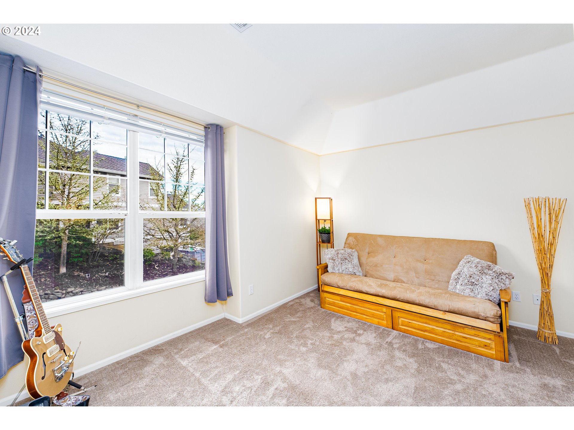 14915 Southwest Osprey Court Beaverton, OR 97007 - Photo 22 of 38 a bedroom with furniture and a window