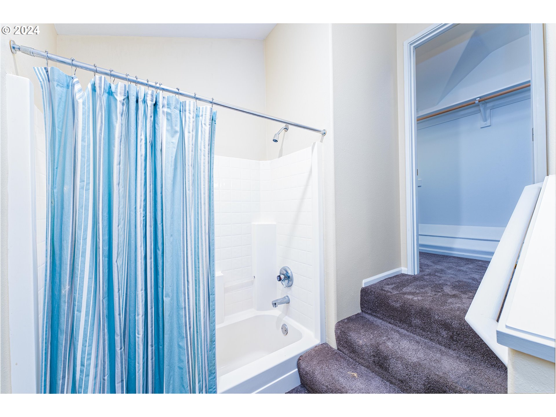 14915 Southwest Osprey Court Beaverton, OR 97007 - Photo 24 of 38 a bathroom with a bathtub and shower