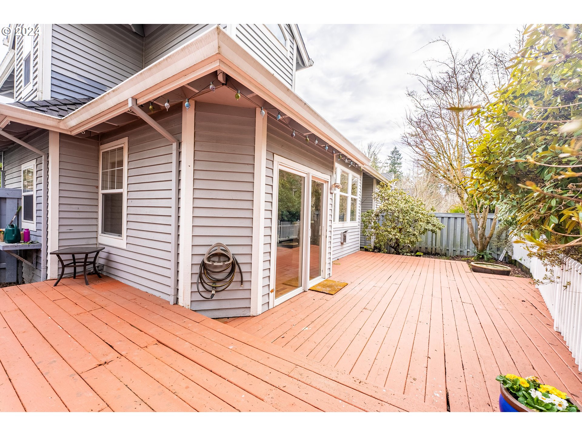 14915 Southwest Osprey Court Beaverton, OR 97007 - Photo 29 of 38 a view of a backyard with sitting area