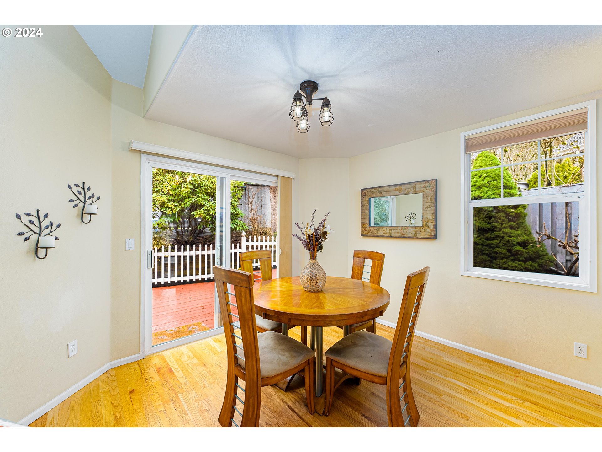 14915 Southwest Osprey Court Beaverton, OR 97007 - Photo 6 of 38 a view of a dining room with furniture and a window