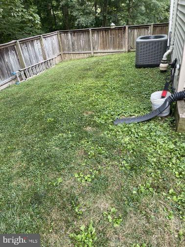 604 Rocky Ridge Road Spring Grove, PA 17362 - Photo 14 of 47 Lush green yard with wooden fence.