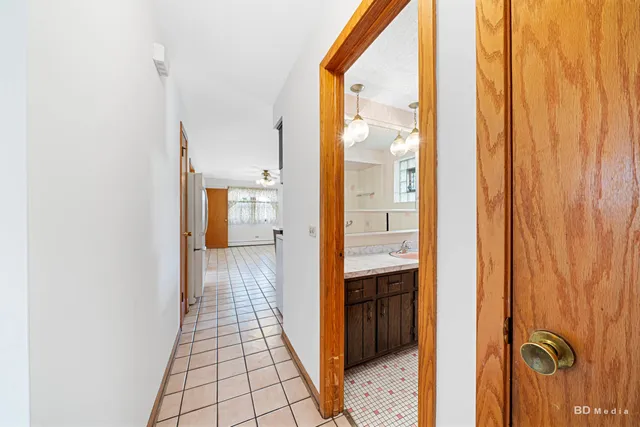 a kitchen with a sink cabinets and appliances